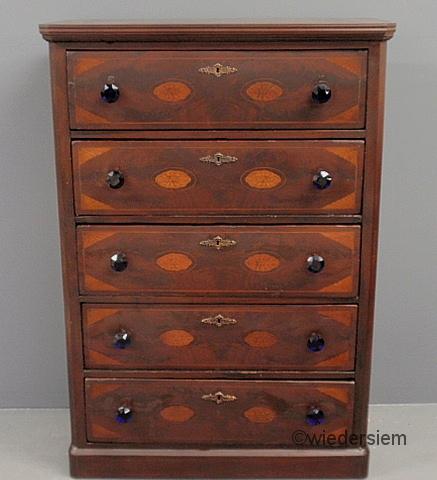 Unusual inlaid mahogany five-drawer