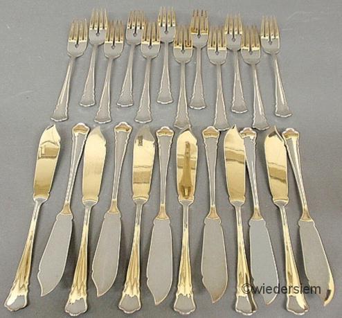Set of twelve fish forks with twelve