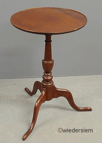 Mahogany candlestand with a circular