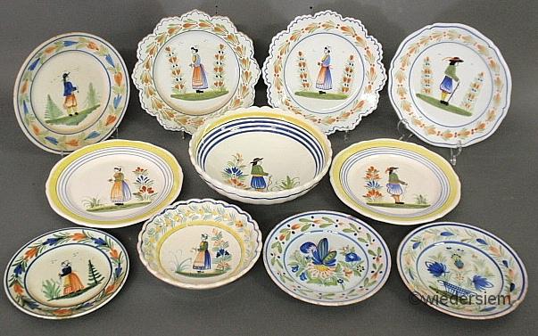 Eleven pieces of Quimper tableware