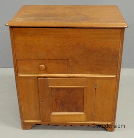 Walnut commode with a lift lid