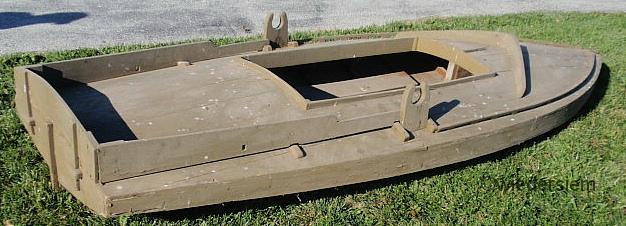 Green painted cedar duck boat with centerboard