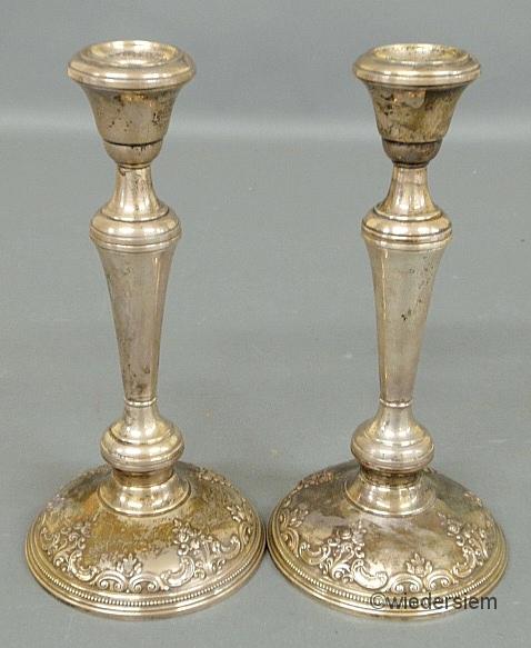 Two weighted sterling silver candlesticks