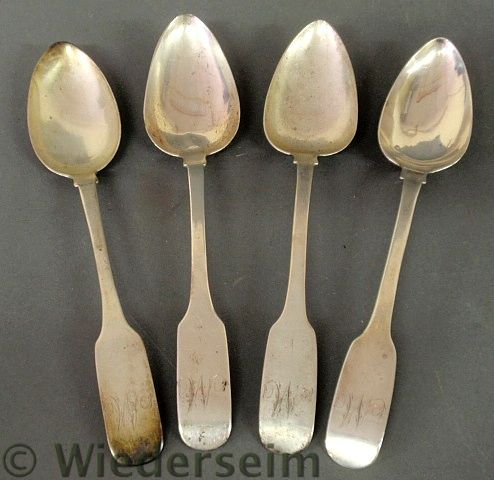 Set of four coin silver tablespoons