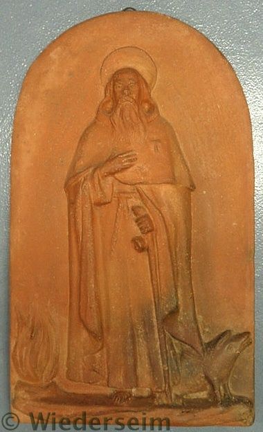 Terracotta plaque with a raised