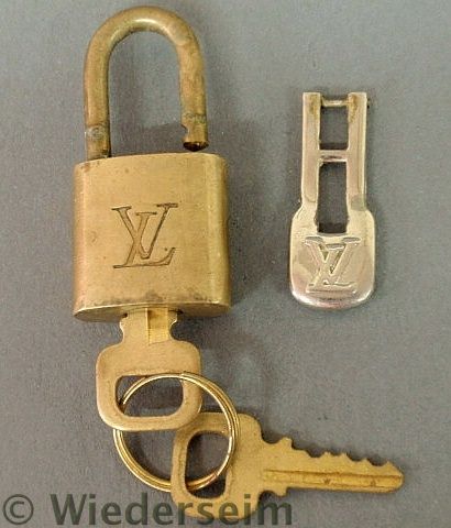 Small brass Louis Vuitton padlock with