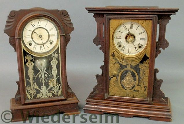 Two Victorian walnut mantel clocks.