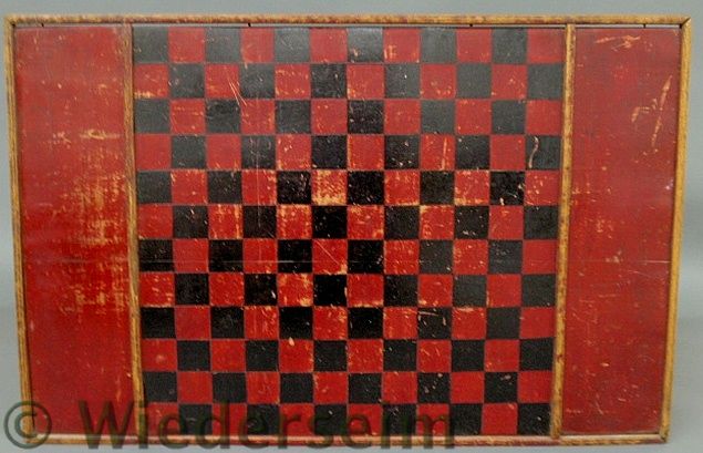 Large red and black painted checkerboard
