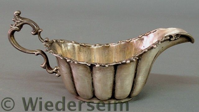 Sterling silver gravy or sauce boat.