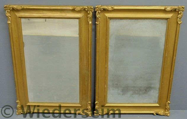 Pair of gilt decorated 19th c. mirrors.