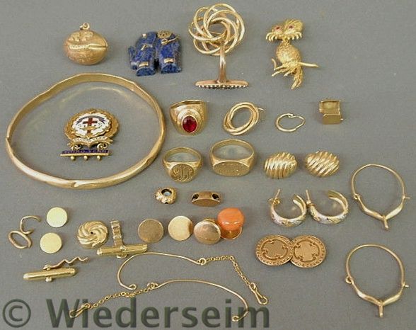 Group of gold jewelry accessories