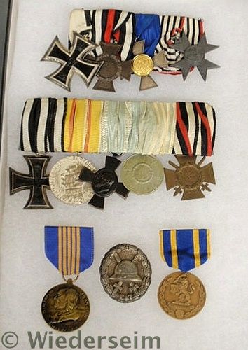 Cased tray of medals and ribbons