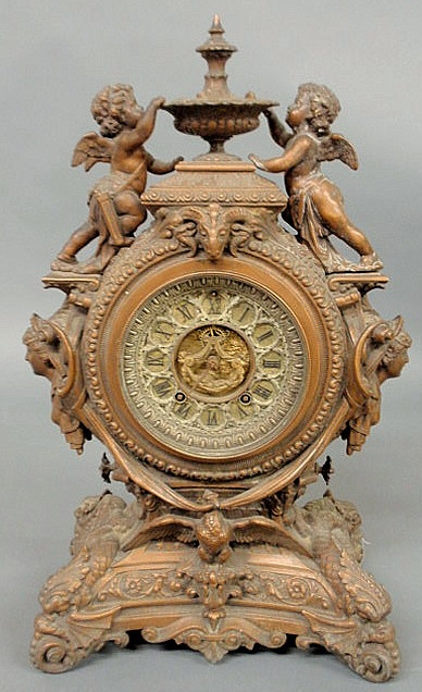 Ornate faux bronze mantel clock