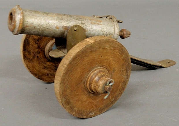 Carved wood and metal working toy