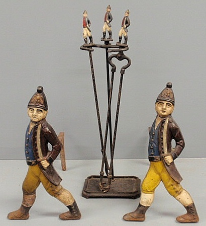 Pair of cast iron andirons with American