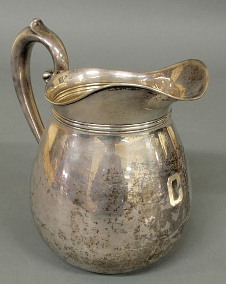 Sterling silver water pitcher by Wallace