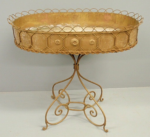 Brass-colored metal wire plant stand
