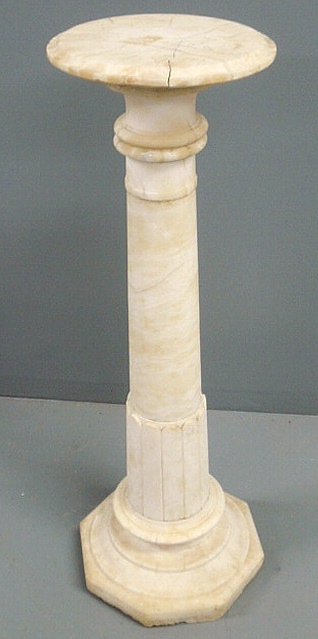 Carved alabaster pedestal with