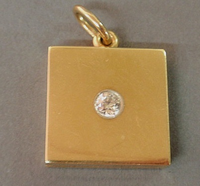Square 14k gold locket with a 40