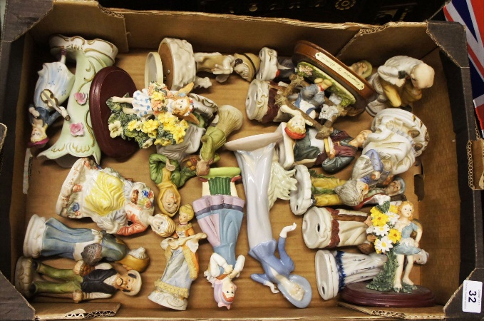 A collection of various pottery figures