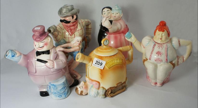 A collection of Novelty Teapots 159ec2