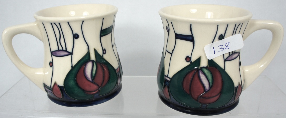 Pair Moorcroft Mugs decorated in 15a01d