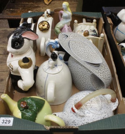 A collection of Tea Pots from Various 15a828