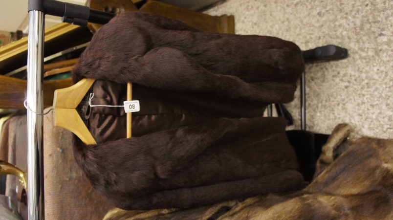 A Ladies Short Fur Coat in Dark Brown