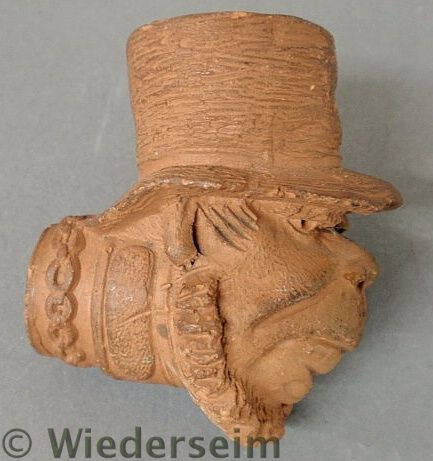 Rare redware pipe folk art figure