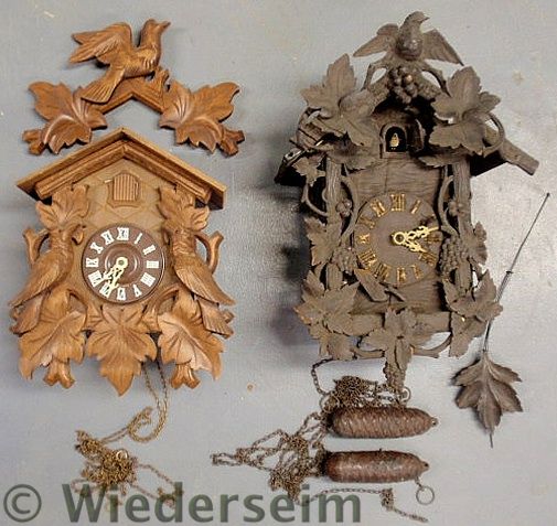 Two carved Black Forest cuckoo