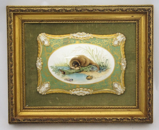 A handpainted pottery plaque of
