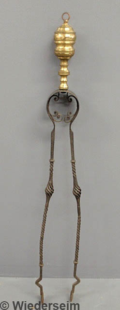 Wrought iron fireplace tongs with brass