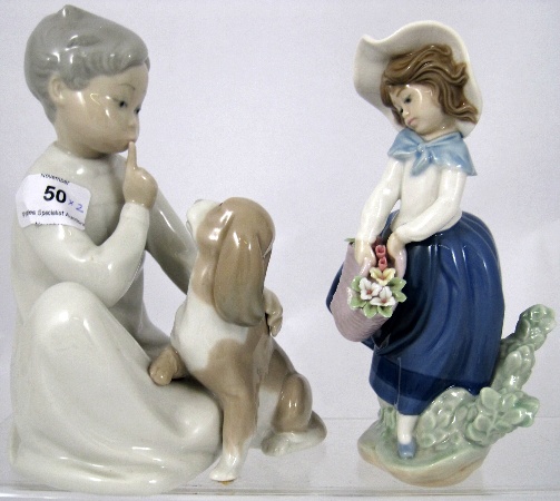 Lladro model of a boy with a Dog and