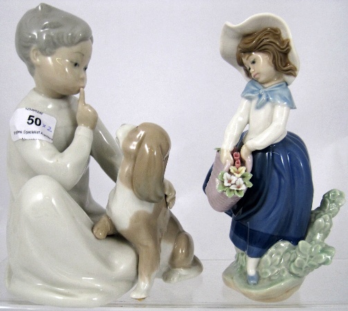 Lladro model of a boy with a Dog