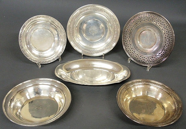 Five sterling silver plates and an oval