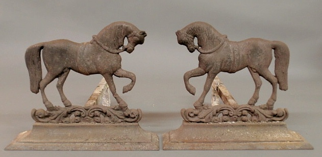 Pair of cast iron horse andirons late