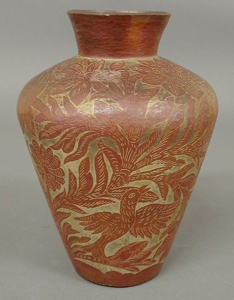 Hammered copper vase with incised decoration