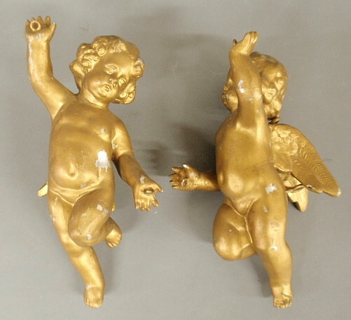 Pair of metal putti with gilt paint