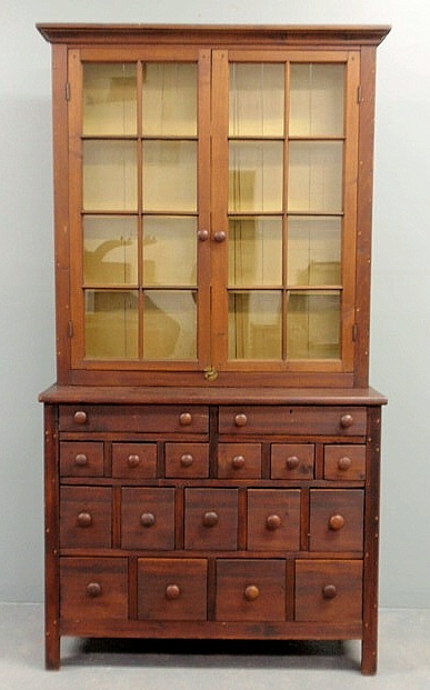 Pine two-piece apothecary cabinet