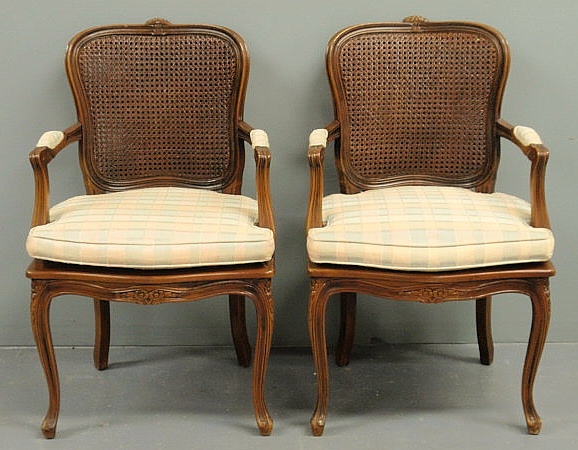 Pair of French fruitwood fauteuils