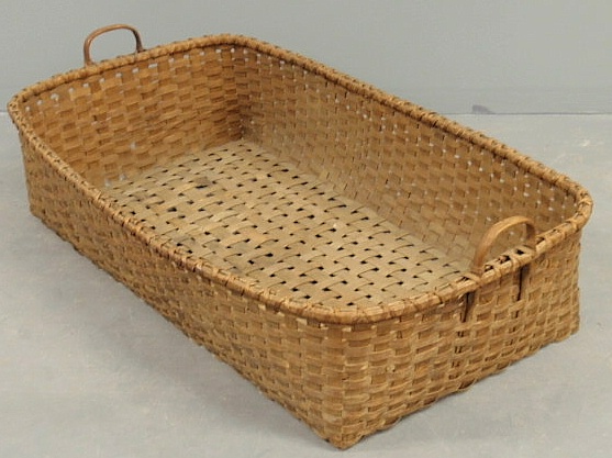 Massive rectangular splintwood basket.