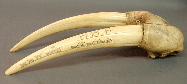 Walrus tusk scrimshaw with Eskimos