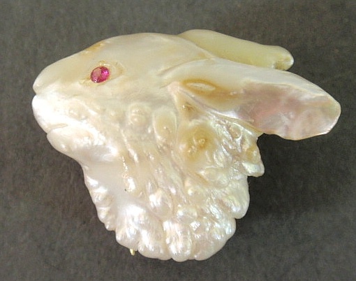 Carved mother of pearl rabbit head