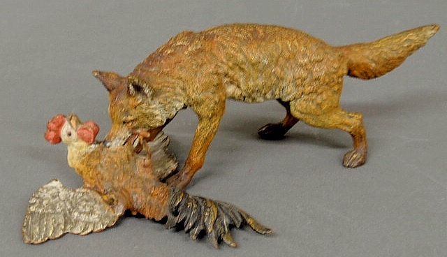 Cold painted bronze of a fox with a