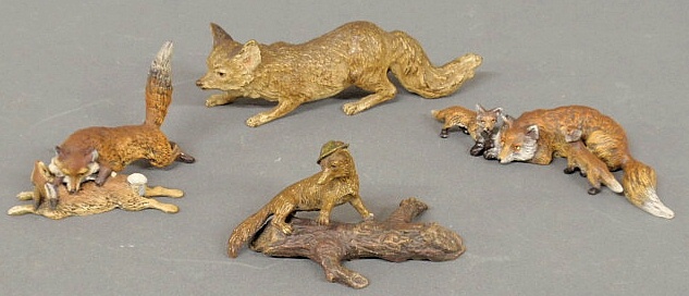 Four cold painted bronze foxes 158f45