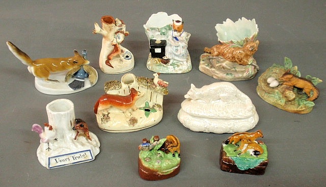 Group of ten porcelain fox figural