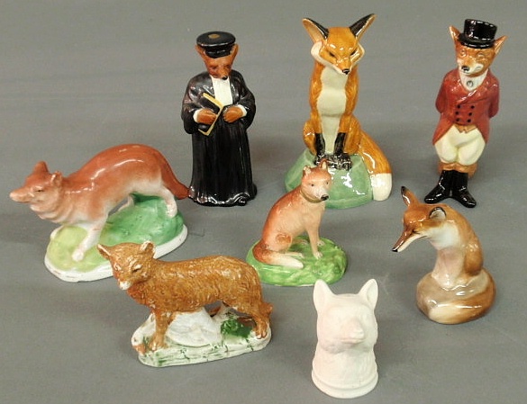 Eight porcelain fox figures including 158fba