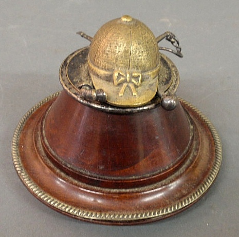 Inkwell with a brass jockeys cap cover