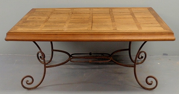 Wrought iron garden table with an inlaid