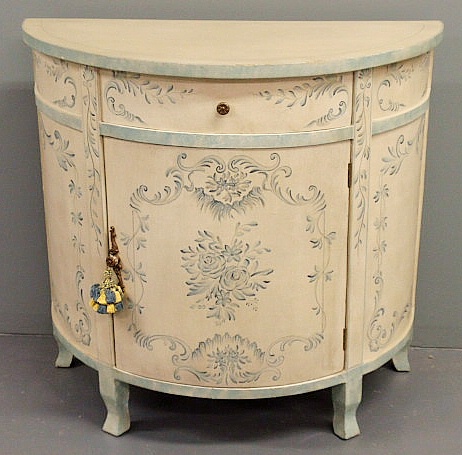 French style painted demilune cabinet.